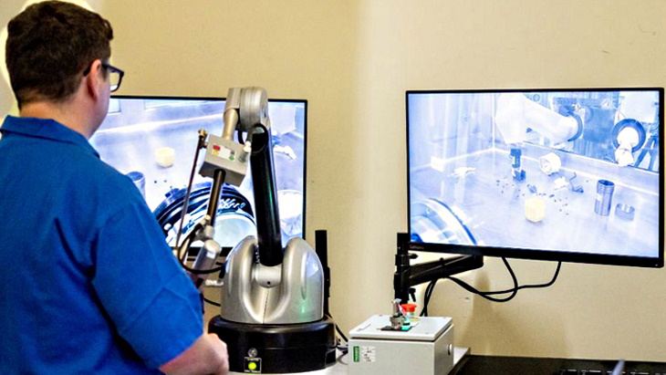 Robotic arm retrofitted to old glovebox at Sellafield